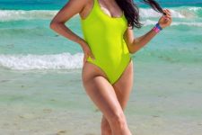 a hot green one piece swimsuit