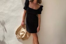 a casual summer look in a black dress