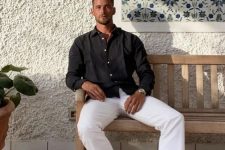 a simple and stylish outfit with a black linen shirt, white jeans and grey birkenstocks is a lovely solution for many summer dates