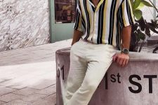 a summer date or beach date look with a vertical stripe short-sleeved shirt, neutral linen pants, grey birkenstocks is easy and comfortable