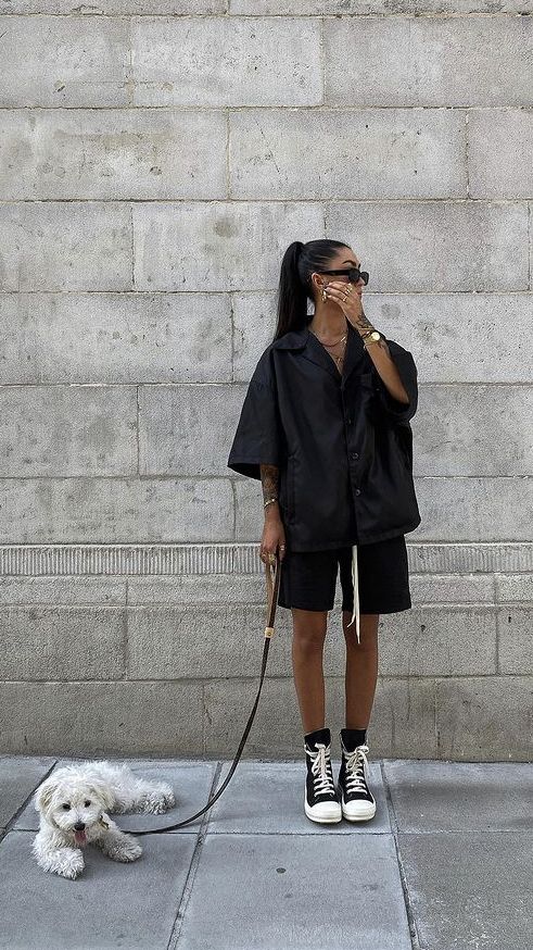 a super relaxed summer look with an oversized black linen shirt and shorts, black high top sneakers for every day