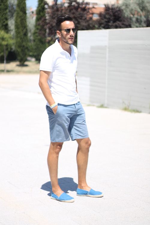 a vacation look with a white polo shirt, blue shorts, blue espadrilles is an easy idea for a seaside holiday