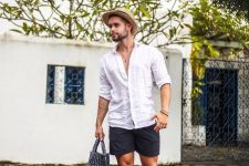 a stylish men’s look with black sandals