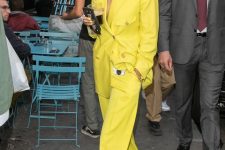05 a bold yellow power suit with an oversized blazer, grey sneakers and statement necklaces for work