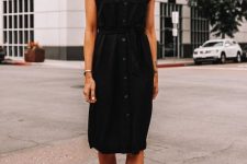 14 a simple and pretty black shirtdress with cap sleeves and a row of buttons, black ankle strap shoes is cool