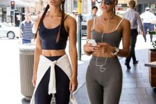 23 sexy workout looks with matching sets – a navy and a grey one with leggings and crop top, white and grey trainers