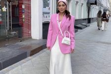 26 a lovely and elegant summer work look with a neutral slip midi dress, white shoes and a bag and a pink oversized blazer