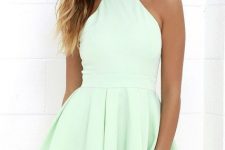A mint green halter tiered mini dress