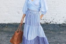 With blue striped button front maxi skirt, brown leather tote bag and brown tassel flat sandals