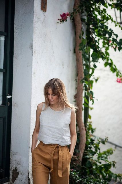 With brown linen high-waisted belted pants