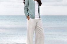 With white t-shirt, mint green cardigan and white and light gray lace up flat shoes