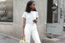 a girlish look with a white tee, white jeans, black kitten heels and a straw beaded bag
