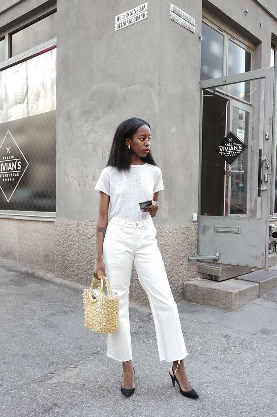 a girlish look with a white tee, white jeans, black kitten heels and a straw beaded bag