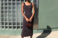 a minimalist summer look with a black midi tank dress with a square neckline, black sandals and a brown mini bag