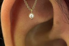 a unique gold chain with a pearl is a fantastic solution for your helix or rook and it will look gorgeous adding a soft touch