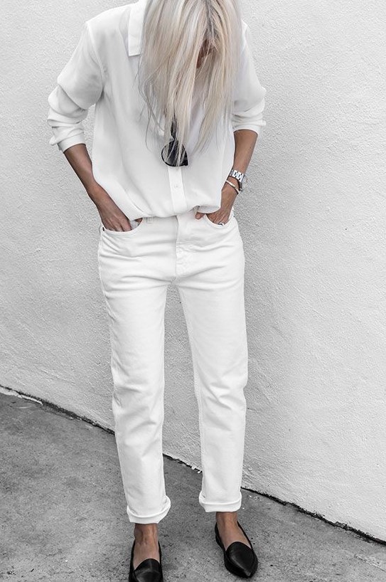 a white shirt, white jeans, black flats and sunglasses for a chic and timeless summer minimalist look