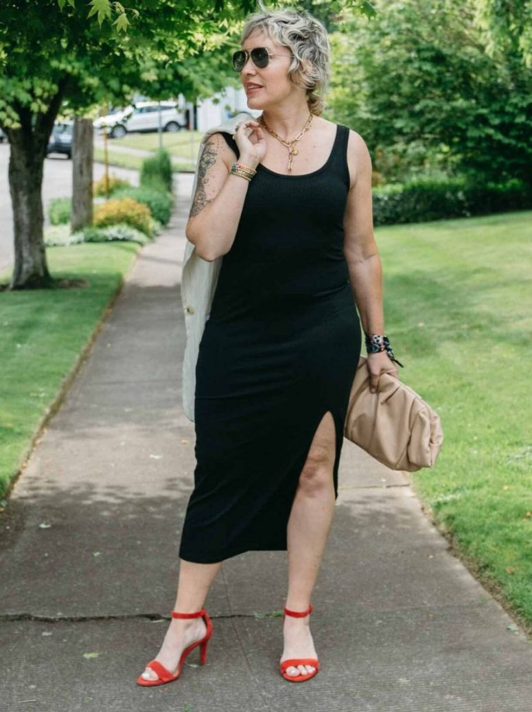 an elevated tank midi dress outfit with red ankle strap shoes and a large tan clutch
