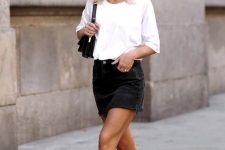 an everyday outfit with a white t-shirt, a black denim mini, black mules and a white bag is a lovely idea to rock