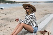 16 a Breton stripe long sleeve t-shirt, blue denim shorts, a straw tote and a wide brim hat for a warm day