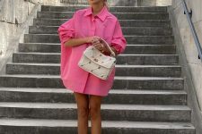 20 a colorful summer look with an oversized pink shirt as a dress, purple heled flipflops and a neutral bag