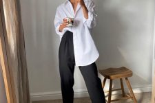 20 a comfy everyday look with an oversized white shirt, black pants, taupe platform birkenstocks is super cool