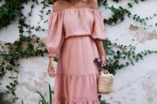With beige wide brim hat, straw basket bag, sunglasses and leather flat sandals