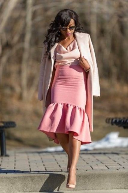 With sunglasses, pale pink satin blouse, pale pink long blazer and beige pumps