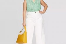With white culottes, yellow leather tote bag and white leather heeled mules