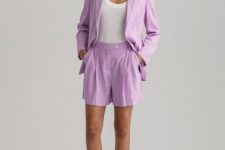 With white fitted top, lilac linen loose blazer and black and beige leather flat sandals
