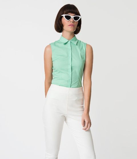 With white framed sunglasses and white high-waisted skinny pants