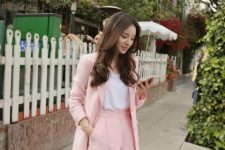 With white loose t-shirt and pale pink linen blazer