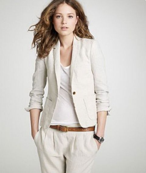 With white loose t shirt, beige blazer and brown leather belt