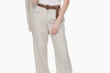 With white t-shirt, beige blazer, brown leather belt and brown leather heeled shoes