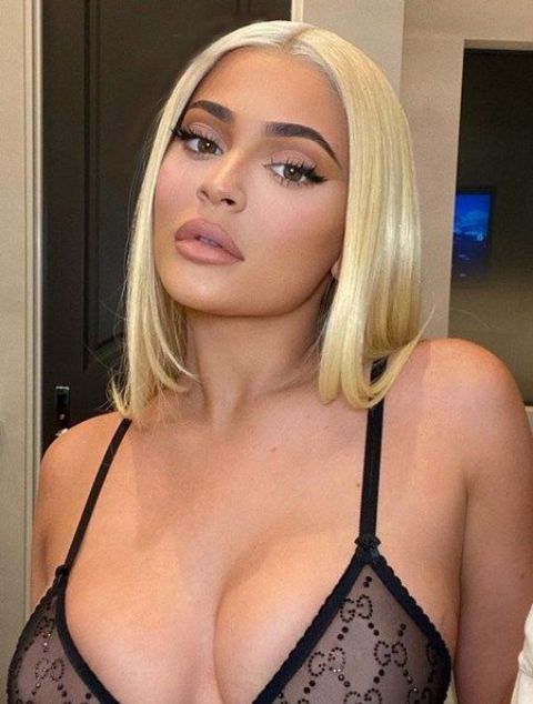a bold creamy blonde liquid long bob by Kylie Jenner is a catchy and chic idea for a modern and bold look