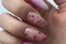 a catchy ombre purple to white manicure with blush nails accneted with neutral and pink dried blooms for summer