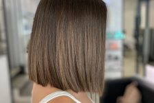 a delicate and all-natural brown long liquid bob with a bit of balayage is a lovely idea for a chic look