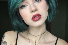 a gorgeous green liquid bob with side parting is a fantastic idea to rock right now, and its bold color will excite