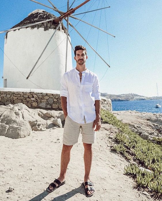 a light vacation look with a white linen shirt, neutral linen shorts and black birkenstocks is a cool idea for having a rest