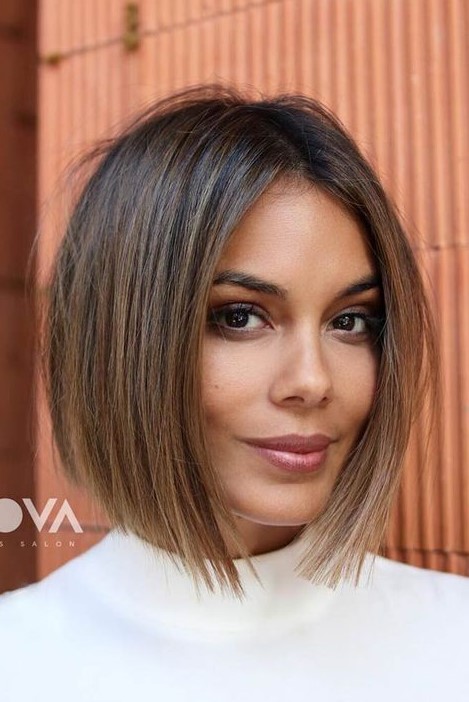 a lovely dark liquid bob with caramel balayage is a very natural and chic idea to style your hair