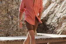 a simple summer outfit with a coral linen shirt, brown shorts, brown espadrilles will be a good idea for a hot day