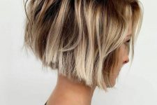 an angled layered bob with subtle graduation and razored layers looks edgy, bold and very cool