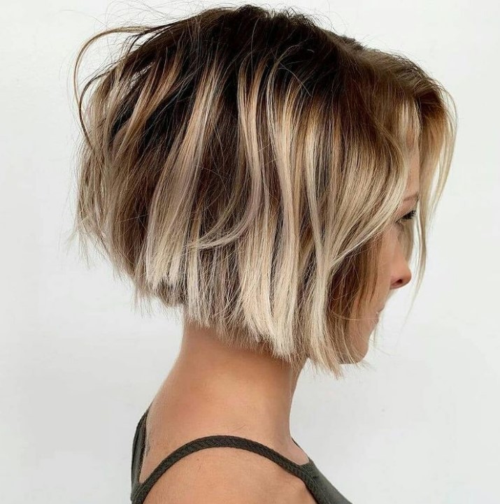 an angled layered bob with subtle graduation and razored layers looks edgy, bold and very cool