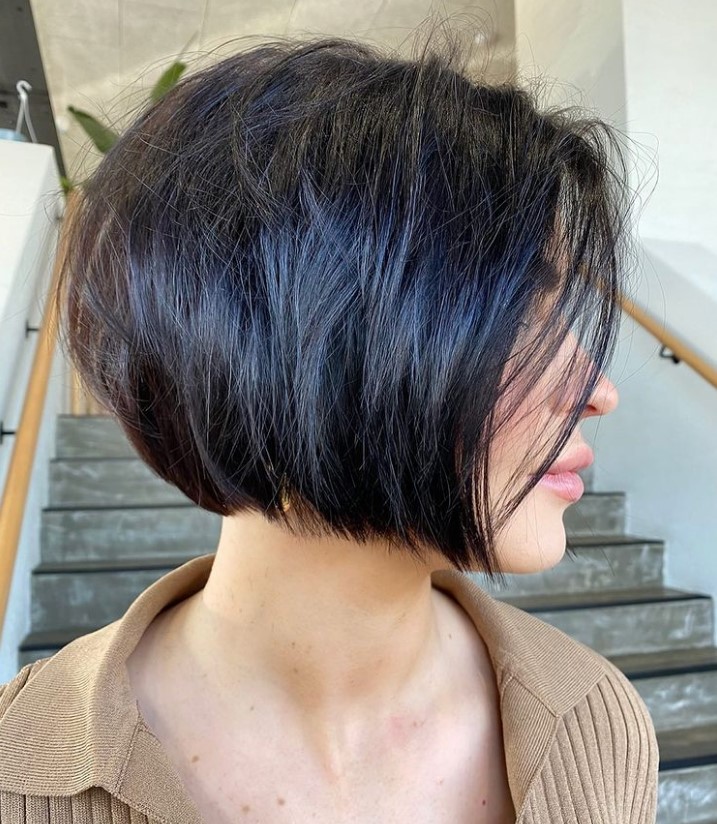 an effortless but chic dark jaw-line layered bob willl work well on all ages and looks very dimensional