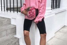 black biker shoes, a pink shirt, neutral trainers and a black leather bag for a bold and trendy summer look