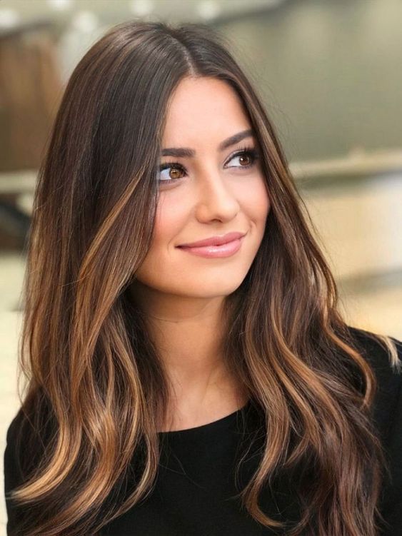 dark brown hair with caramel balayage and babylights to give it interest and illuminate the face at the same time
