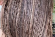 dark brown medium-length hair with delicate blonde and caramel babylights is a lovely idea to bring dimension