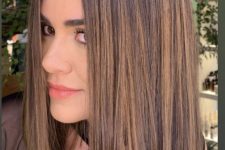 dark brunette hair with beautiful caramel balayage and babylights is a beautiful idea that makes you look eye-catchy