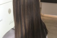 long straight dark brown hair with delicate bronde babylights that make hair look interesting and create and a contrast