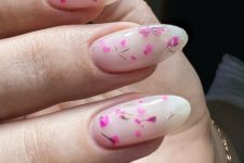 milky nails accented with hot pink and fuchsia dried blooms is a fantastic idea for a summer outfit