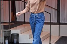 03 a beige turtleneck, bold blue jeans and red shoes worn by Victoria Beckham